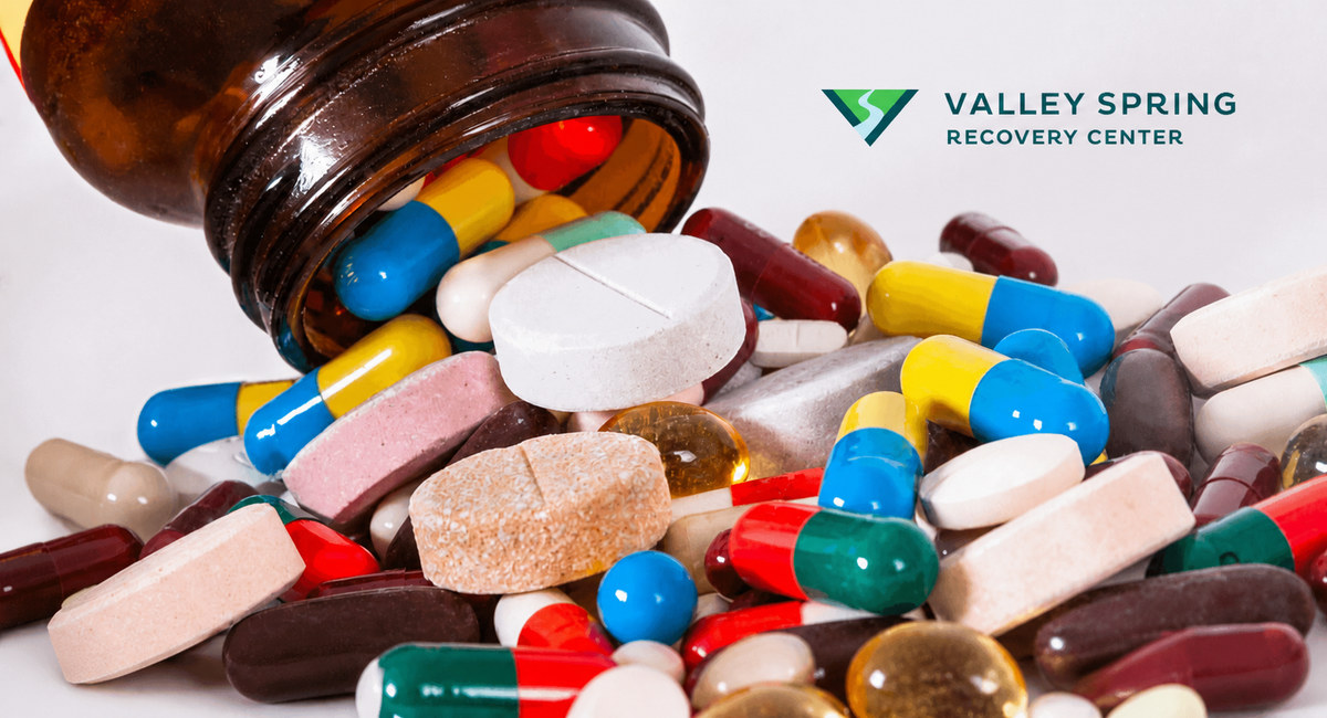 Prescription capsules and tablets in a branded Valley Spring Recovery Center barbiturate article graphic