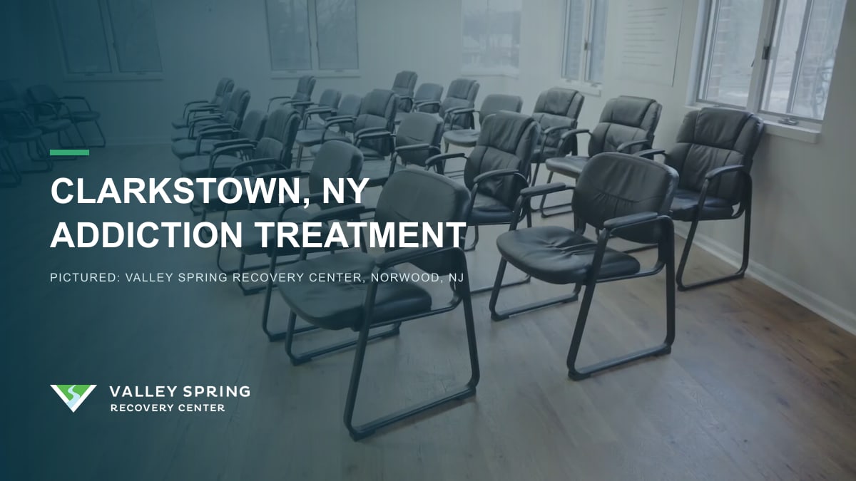 Group therapy room with rows of black chairs inside Valley Spring Recovery Center in Norwood, New Jersey, branded for Clarkstown, New York addiction treatment Group therapy room with rows of black chairs inside Valley Spring Recovery Center in Norwood, New Jersey, branded for Clarkstown, New York addiction treatment