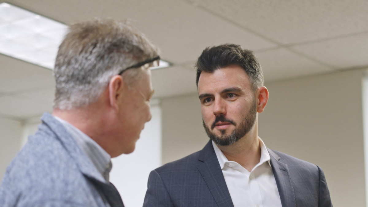 Valley Spring CEO Brian Cellary speaking with a staff member