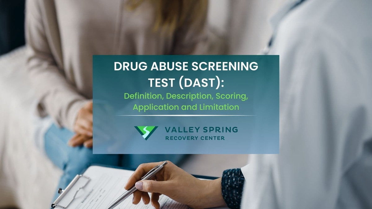 Clinician reviewing a DAST-10 drug-problem questionnaire beside the Valley Spring Recovery Center logo