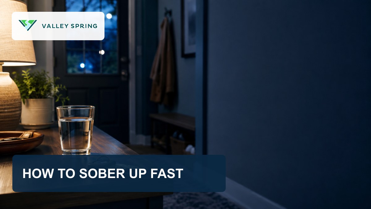 Branded sobering-up article hero showing a glass of water on a bedside table at night