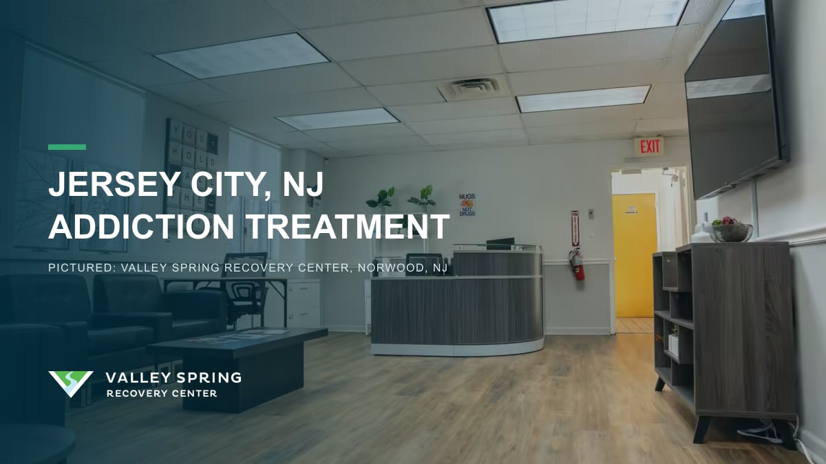 Reception desk and waiting area inside Valley Spring Recovery Center in Norwood, New Jersey, branded for Jersey City addiction treatment access