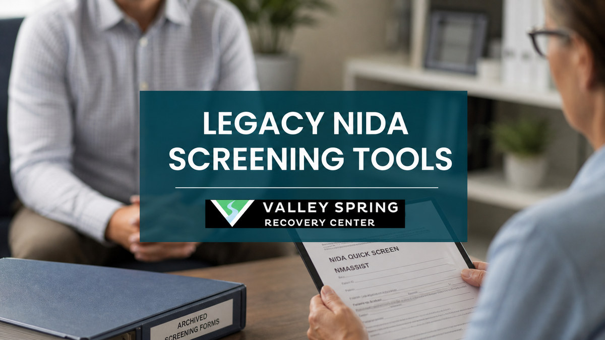 Clinician reviewing archived NIDA Quick Screen and NMASSIST materials