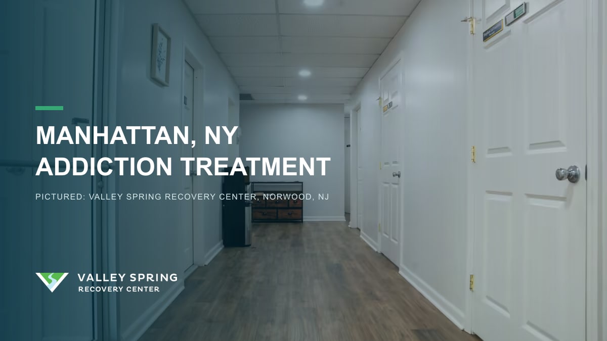 Hallway lined with office doors inside Valley Spring Recovery Center in Norwood, New Jersey, branded for Manhattan, New York addiction treatment access