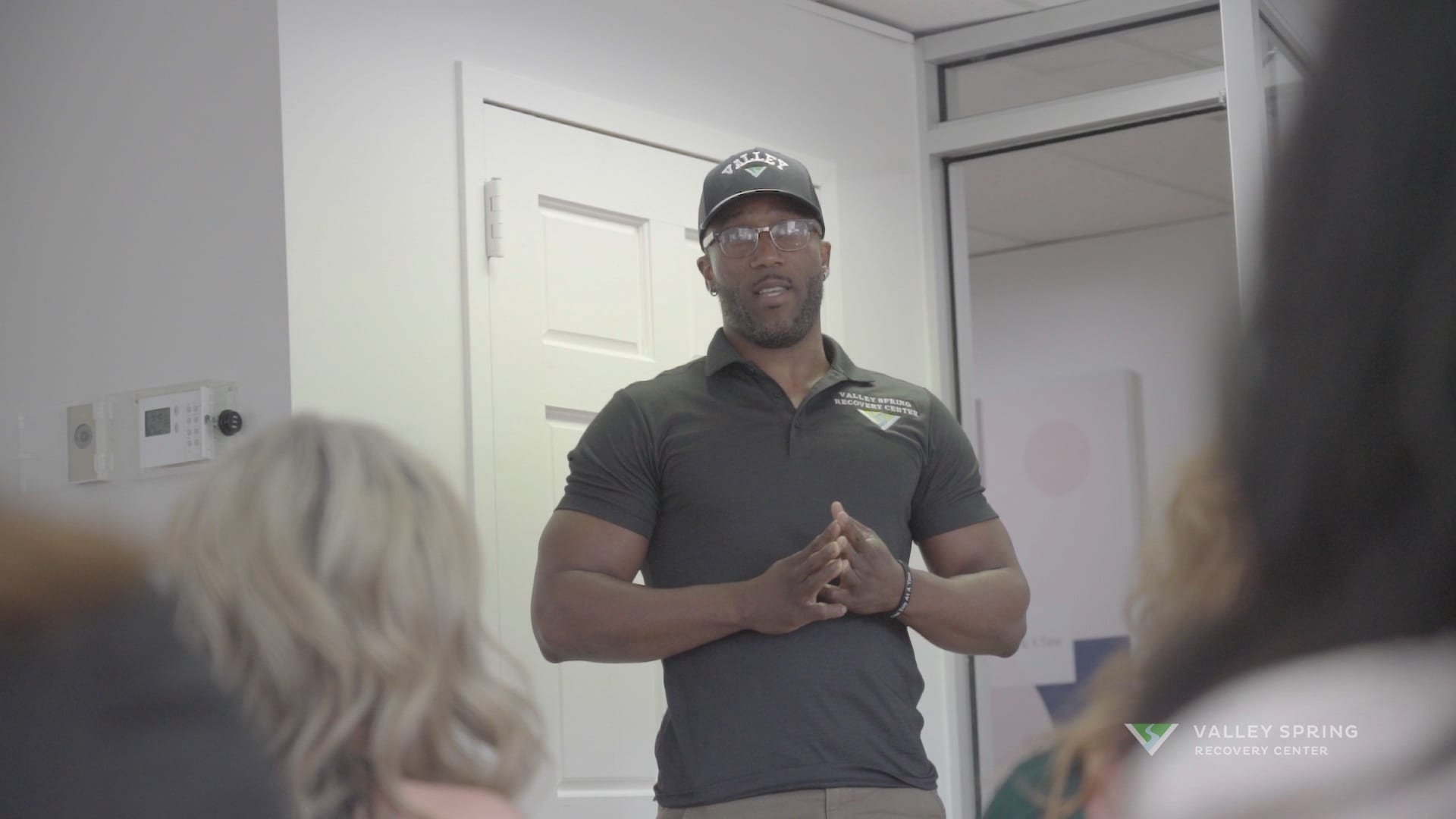 Alumni Coordinator Jordan Lewis-Robinson speaking to a group at Valley Spring Recovery Center in Norwood, New Jersey