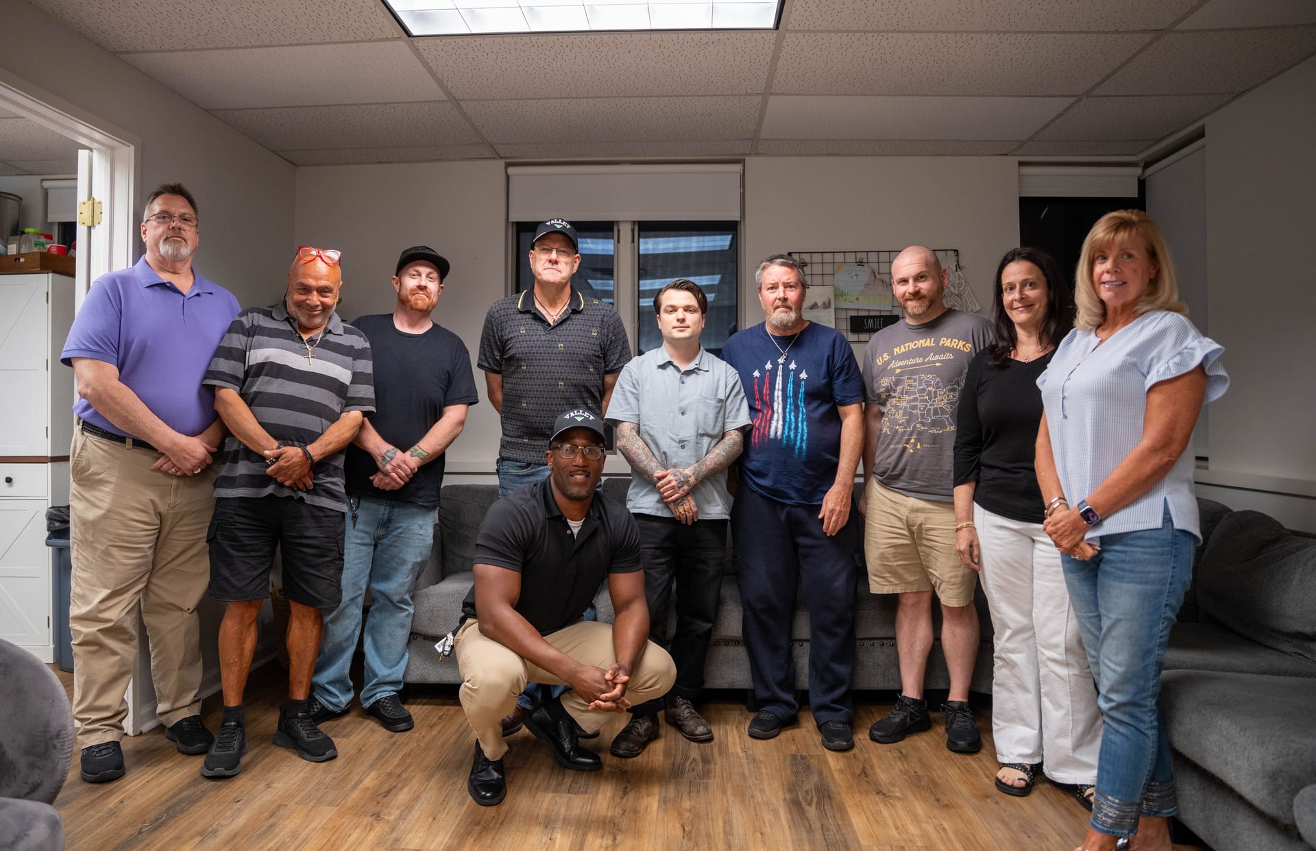 Thrive alumni gathered in a group room at Valley Spring Recovery Center in Norwood, New Jersey, the community clients enter after finishing the Outpatient Program