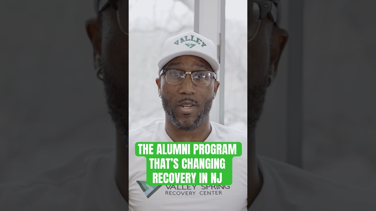 Still from a Valley Spring Recovery Center Short about the THRIVE alumni program, showing a man in a Valley cap above the caption The Alumni Program That's Changing Recovery in NJ